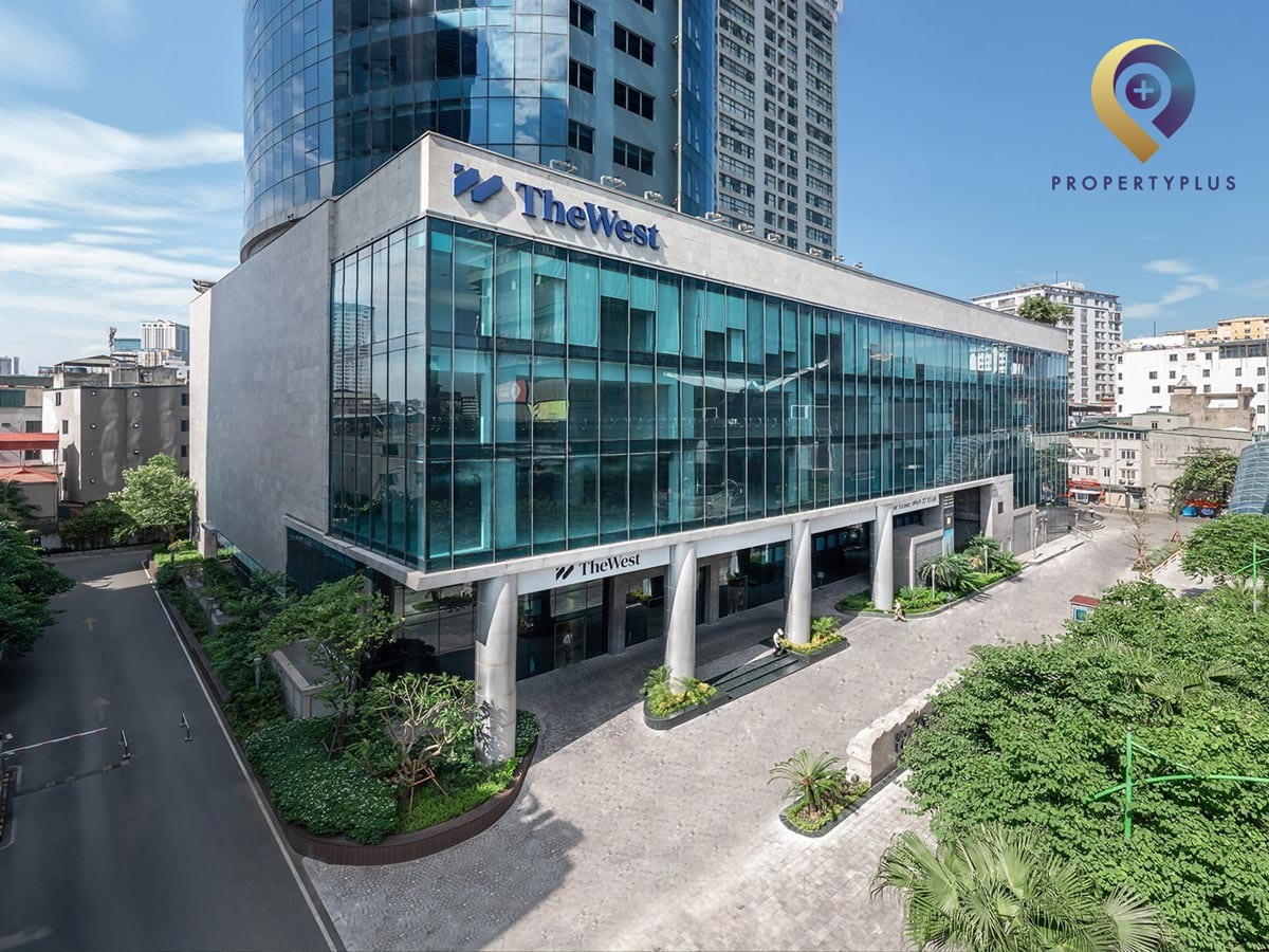Mặt ngoài tòa nhà The-West với kiến trúc hiện đại và không gian xanh